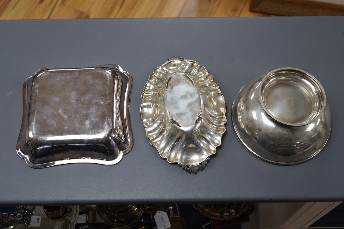 A 20th century Portuguese 833 standard fruit bowl, diameter 20cm, together with an Italian 800 standard two handled dish and a French 950 standard dish, gross 43.2oz.
